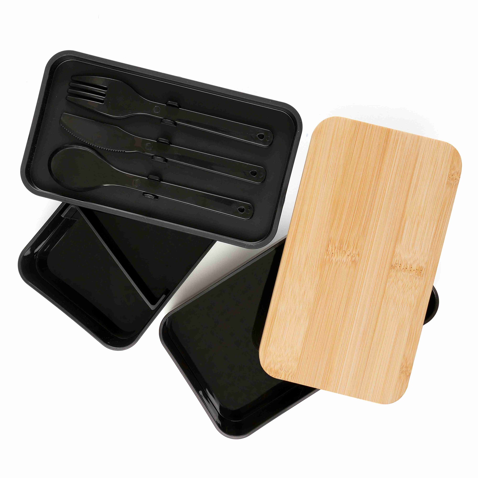 Open double stacked lunch box with bamboo lid and separate compartments; cutlery stored in one compartment